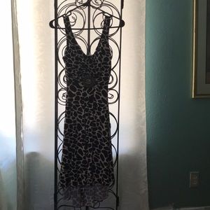 High/low sundress animal print. Ornament beading.